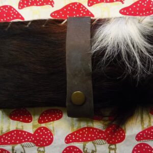 pouch with black and white fur