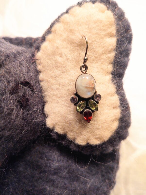 Bejeweled Earring on Left Ear of an Stuffed Elephant Toy